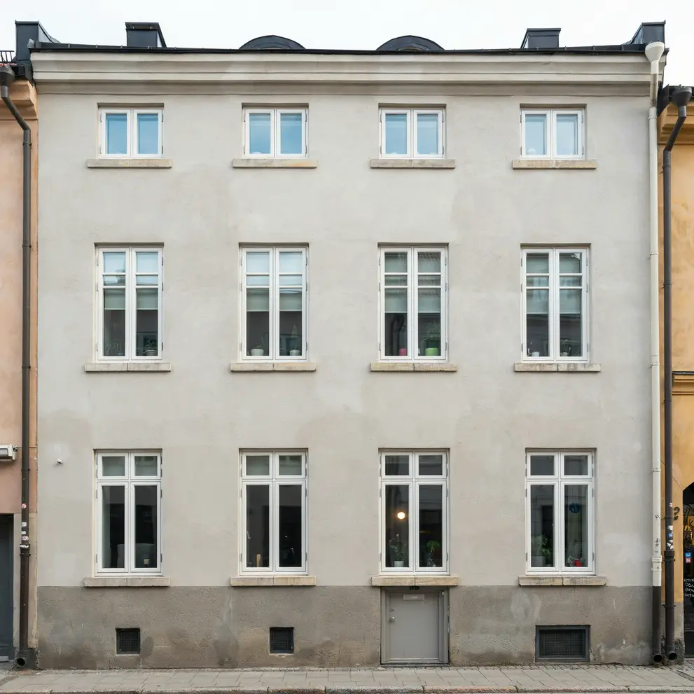 renovera putsad fasad stockholm